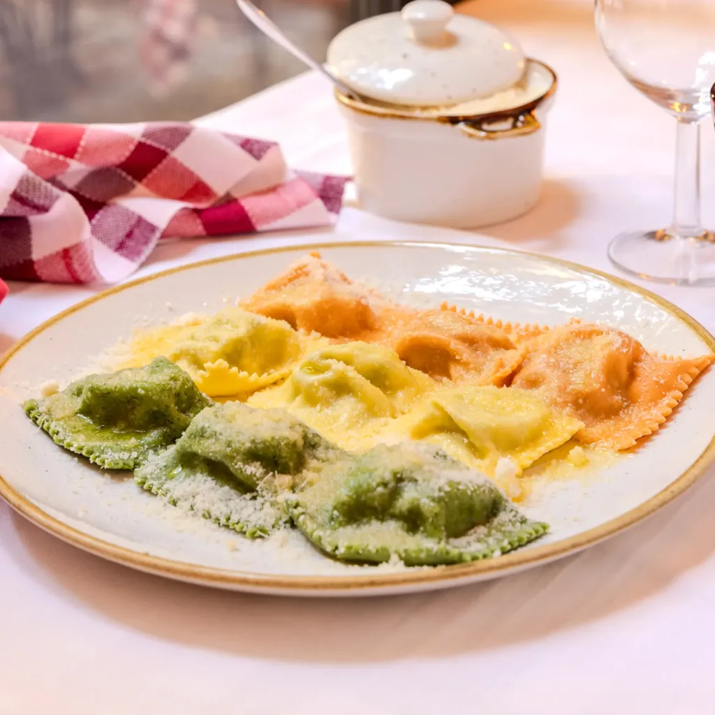 Tris di Tortelli della Trattoria Corrieri, ristorante tipico di Parma con cucina tradizionale emiliana